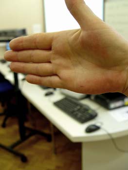 hand showing depth of field smaller